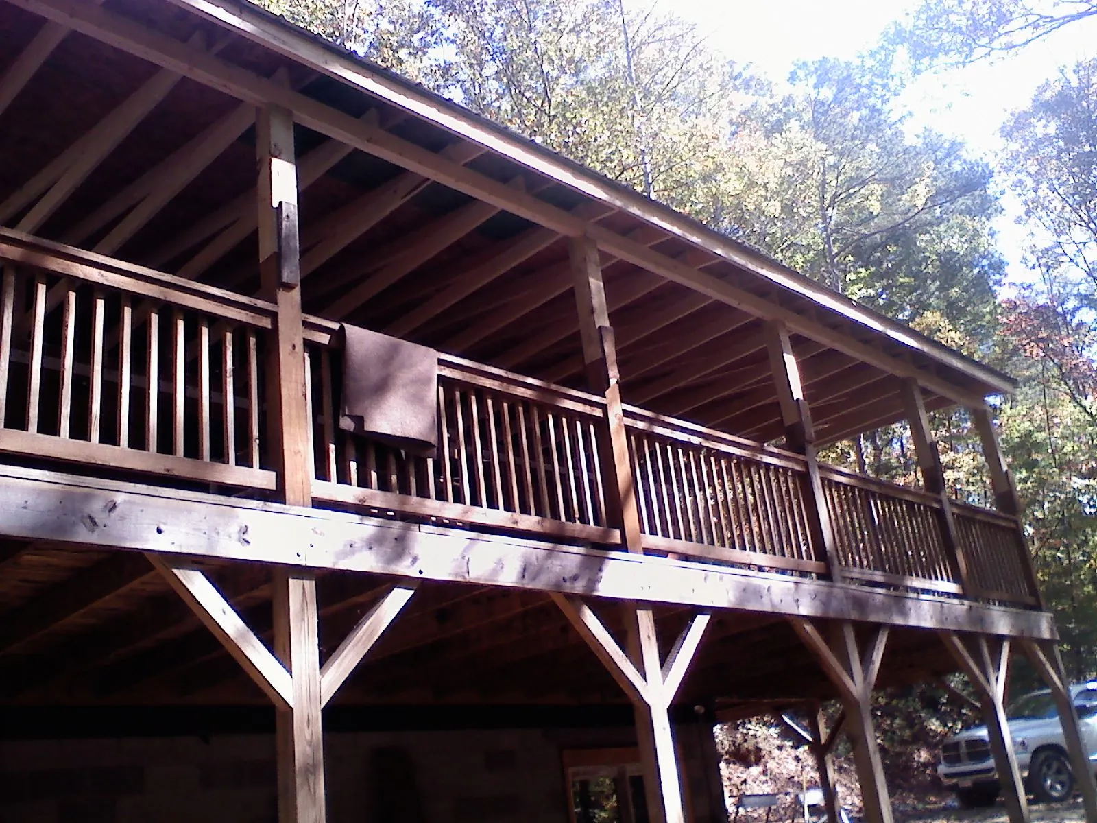 Timber framing under a new elevated porch and deck — Roof Leak Repair in Bernardston by Roofing Brothers
